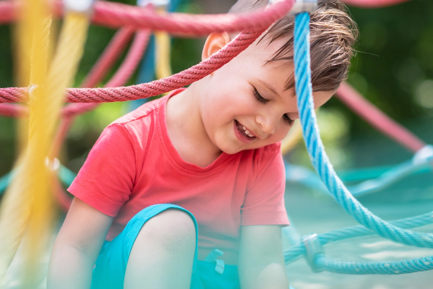 Young child deeply focused on a special interest activity